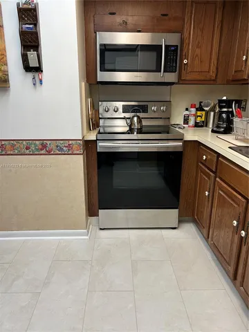 a view of workspace with cabinet