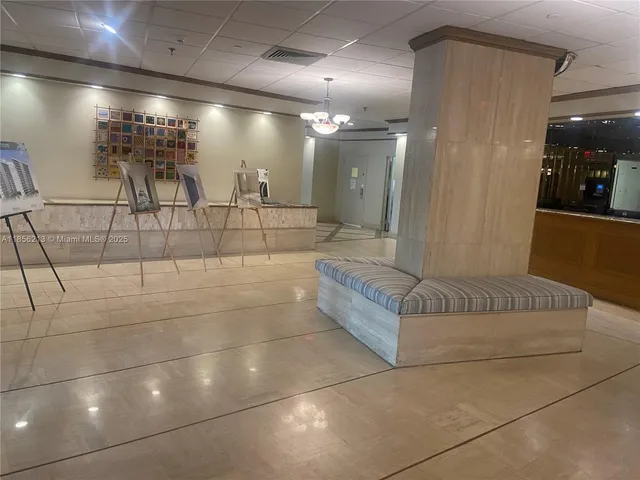 a bathroom with a tub and a mirror