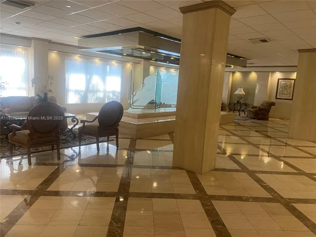 a room with glass door and glass windows