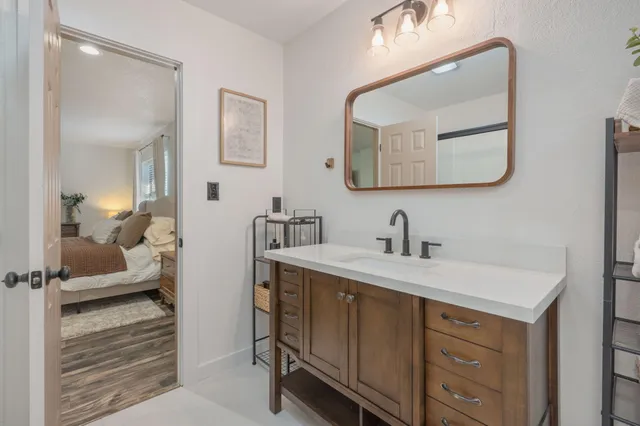 a white bath tub sitting in a bathroom