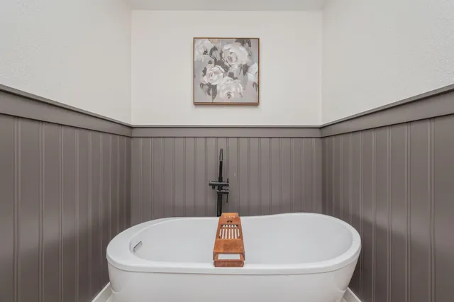 a bathroom with a bathtub