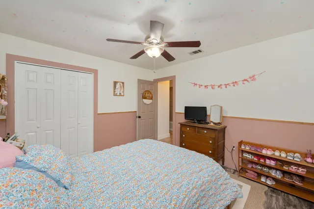 a bathroom with a shower curtain and a bathtub