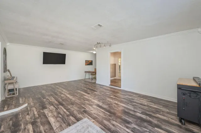 a view of livingroom with furniture and wooden floor