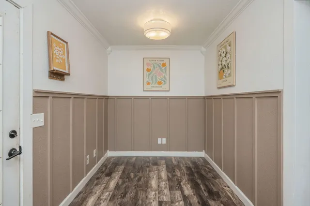 a view of a patio with a table chairs and a backyard