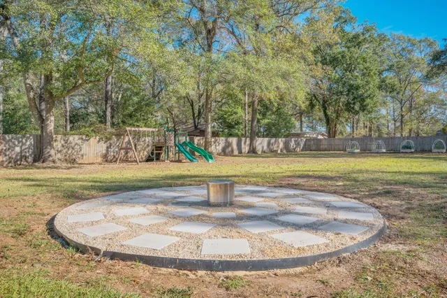 a view of a backyard with a garden
