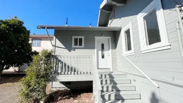 a view of a house with a balcony