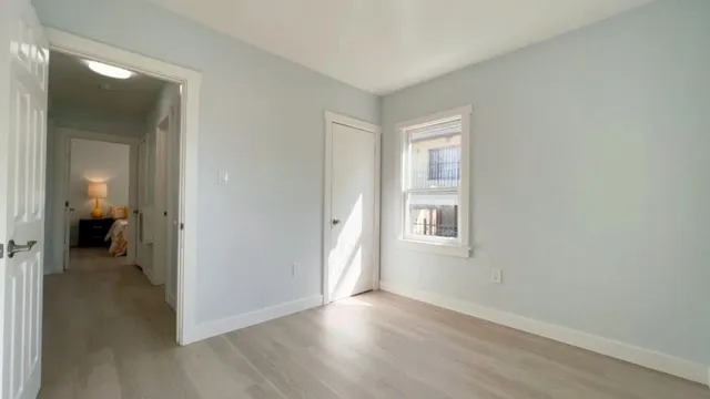 a view of a room that has a window in it