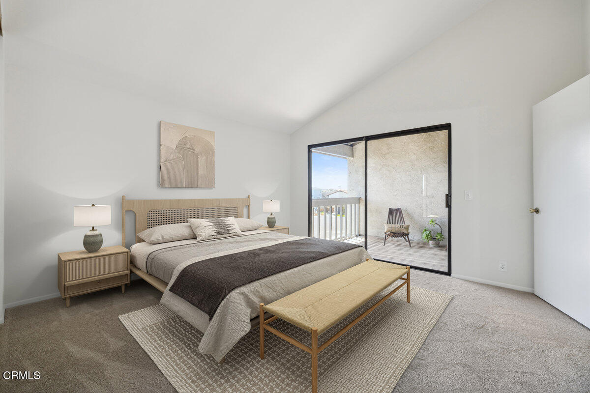 3064 Sunset Lane Oxnard, CA 93035 - Photo 16 of 50 a bedroom with a bed and a large window