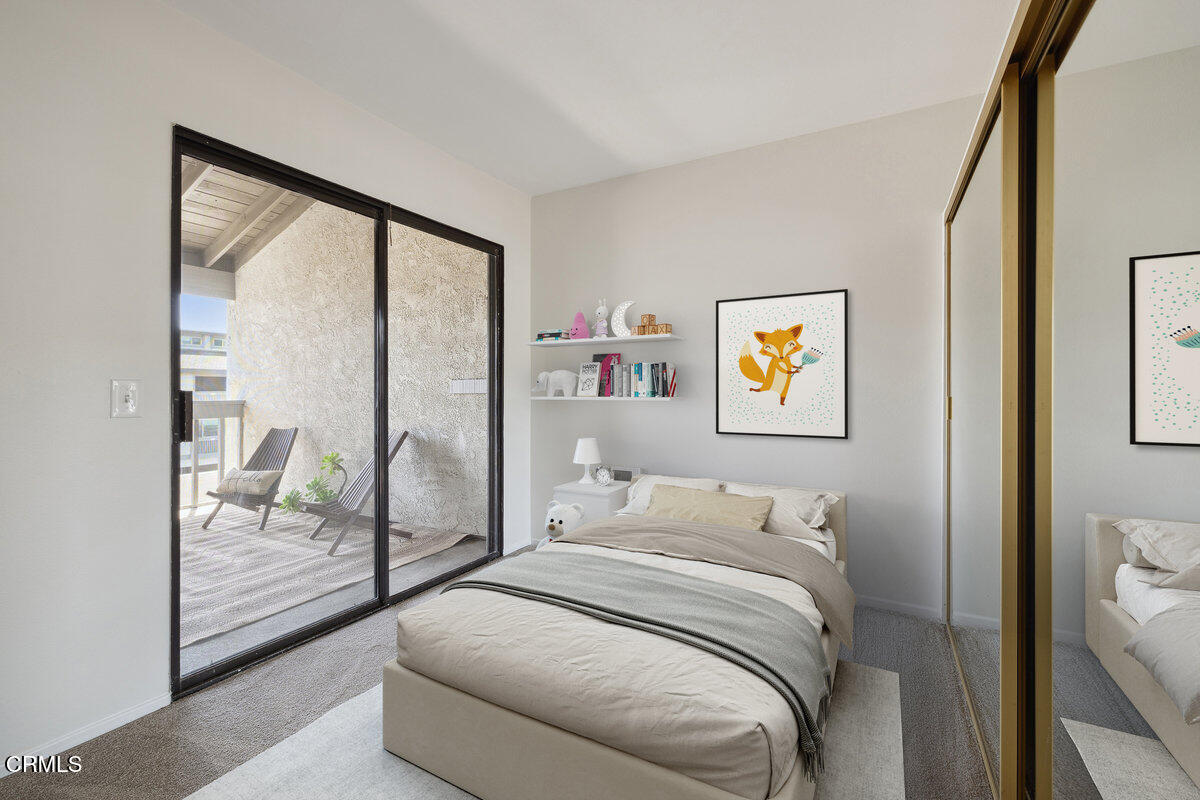 3064 Sunset Lane Oxnard, CA 93035 - Photo 20 of 50 a bedroom with a bed and a glass door