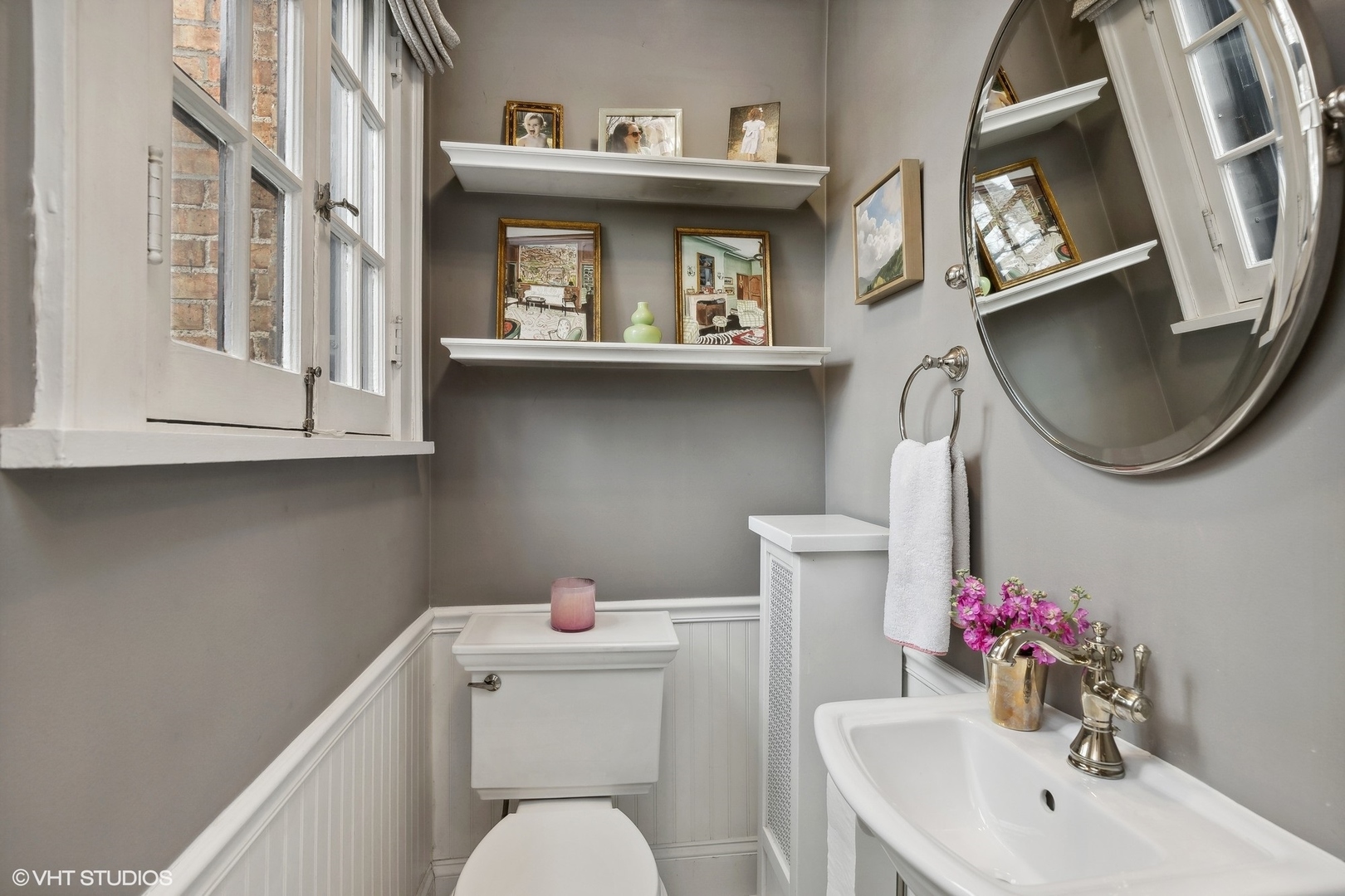 660 Northmoor Road Lake Forest, IL 60045 - Photo 11 of 24 a bathroom with a toilet sink vanity and mirror