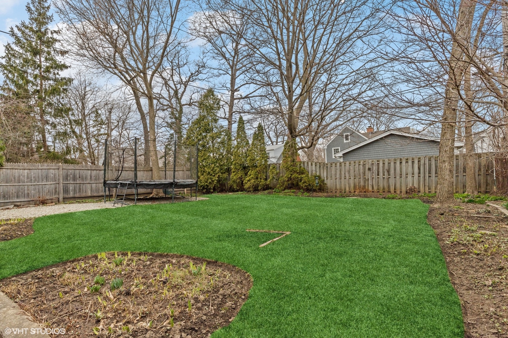660 Northmoor Road Lake Forest, IL 60045 - Photo 21 of 24 a view of a backyard with a garden