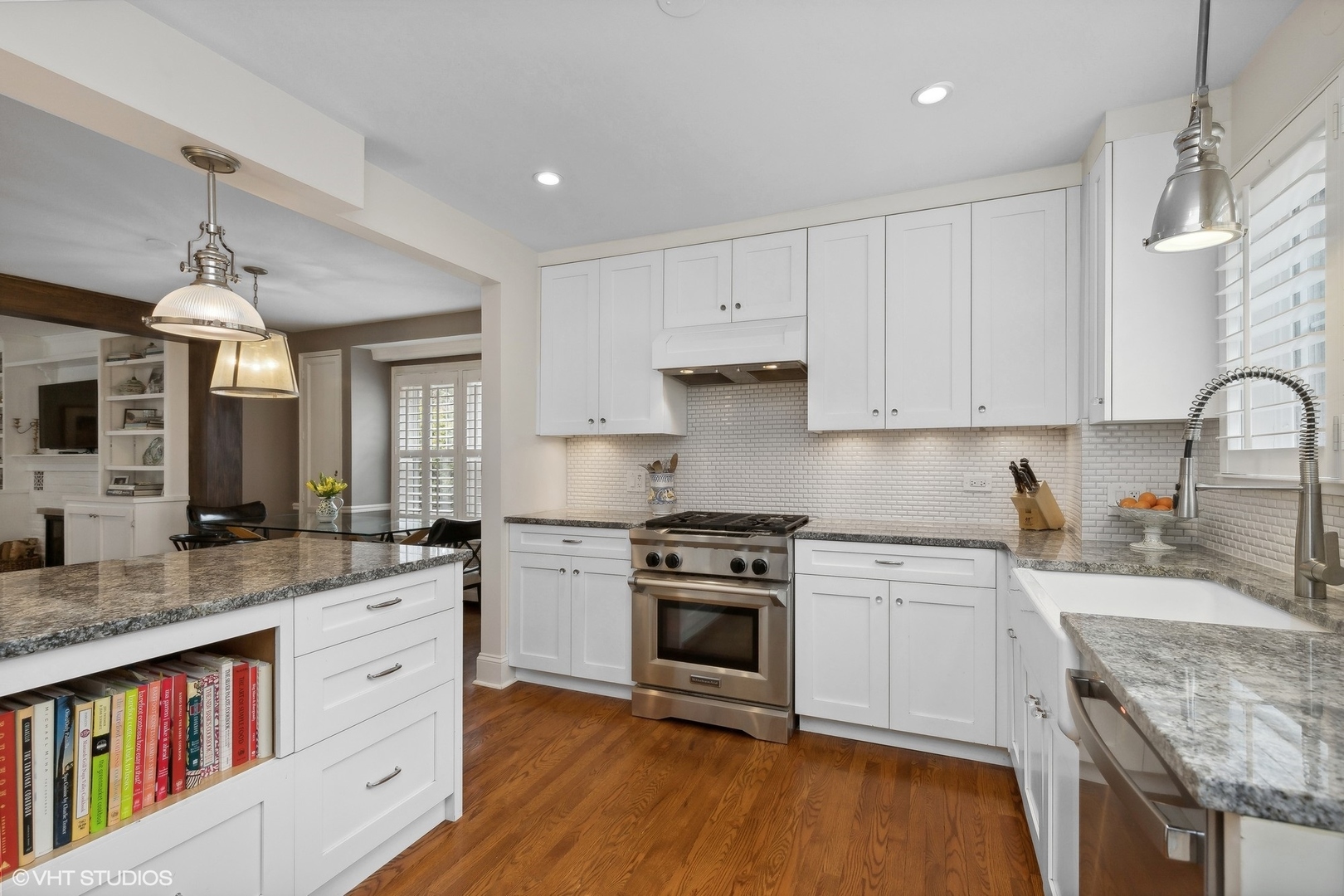 660 Northmoor Road Lake Forest, IL 60045 - Photo 5 of 24 a kitchen with stainless steel appliances granite countertop a stove sink and cabinets
