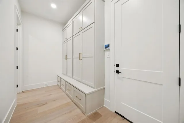 a view of an entryway with white walls