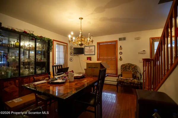 a view of a dining room with furniture