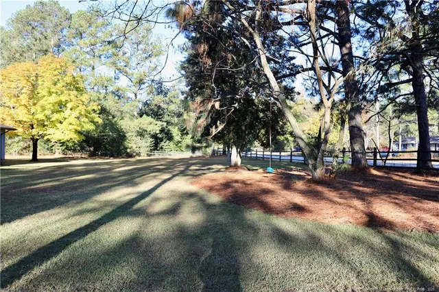 a view of road with trees