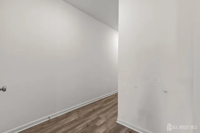 a view of small space with wooden floor