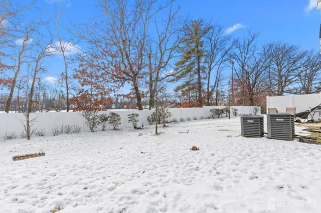 a view of snow on the road
