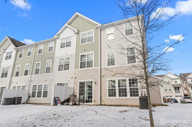a front view of a building with a street