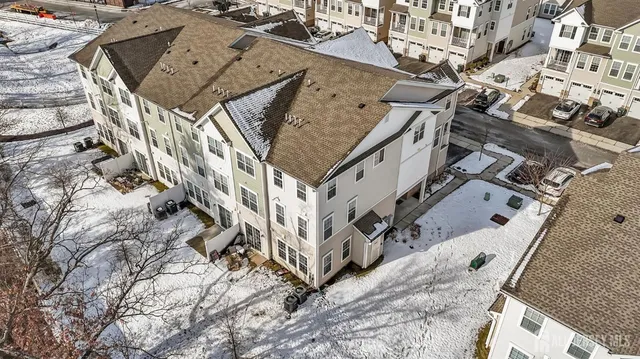 front view of a house with a snow