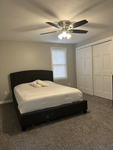 119 Laurel View Road Templeton, MA 01468 - Photo 18 of 28 a bedroom with a bed and a chandelier