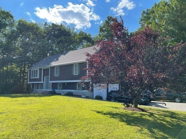 119 Laurel View Road Templeton, MA 01468 - Photo 2 of 28 a view of a swimming pool with a garden