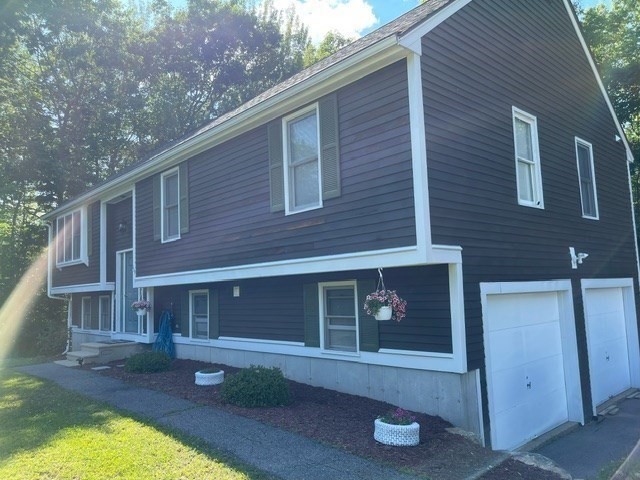 119 Laurel View Road Templeton, MA 01468 - Photo 3 of 28 a front view of a house with garage
