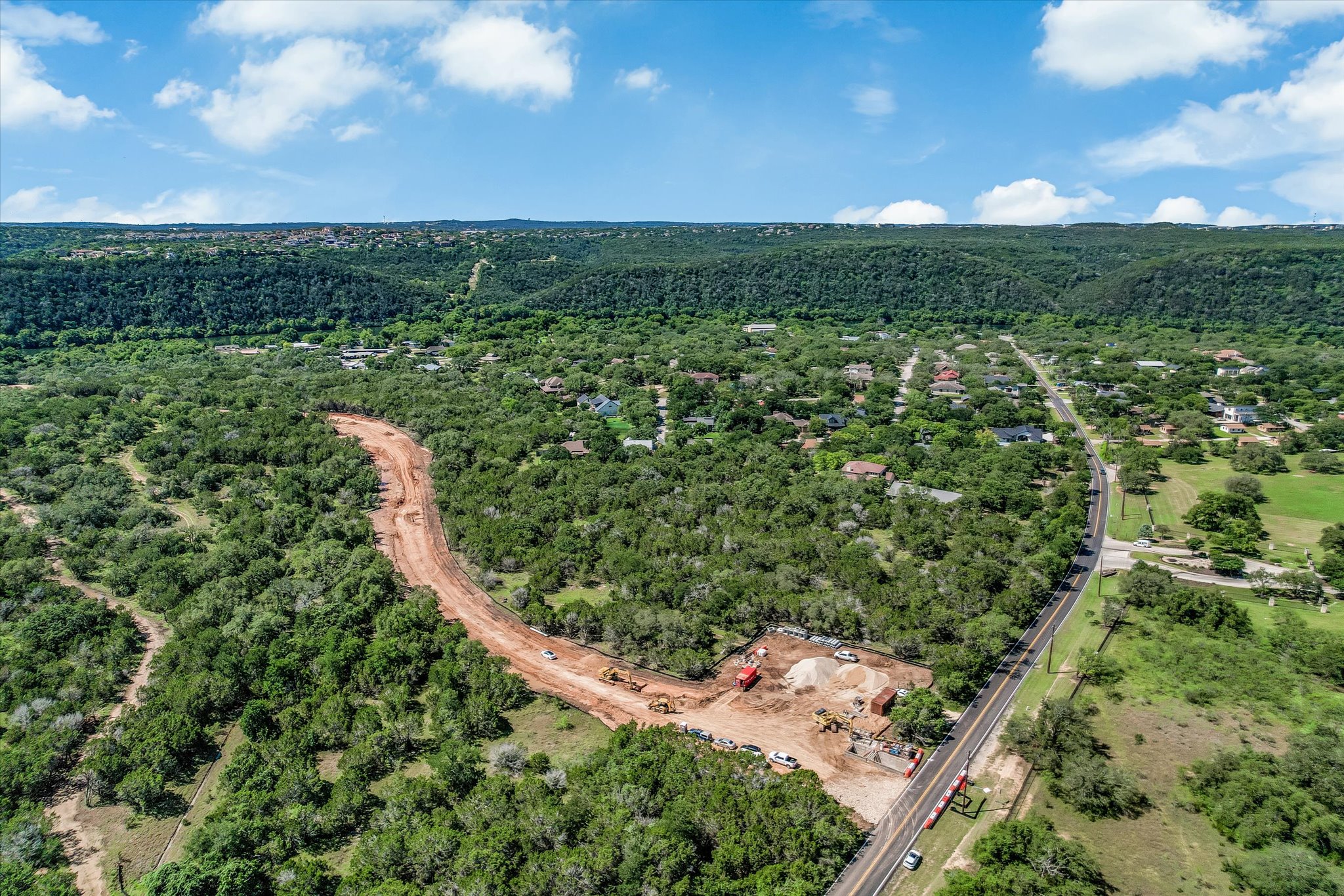 900 North Quinlan Park Road Austin, TX 78732 - Photo 9 of 10 a view of a city with lush green forest