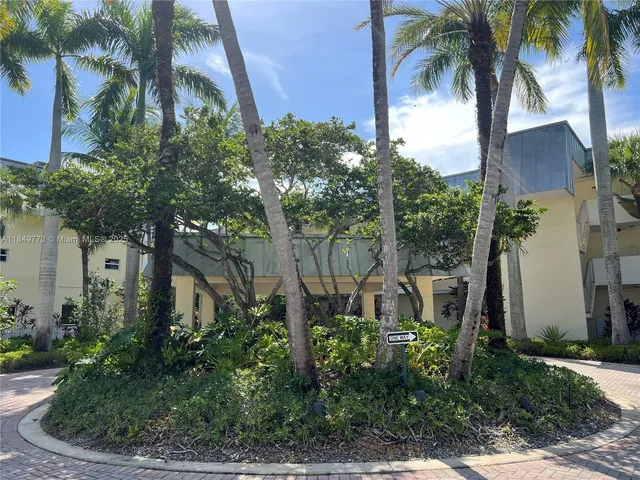 a view of a house with a street