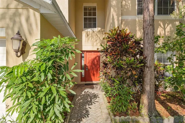 a plant that is in front of a house