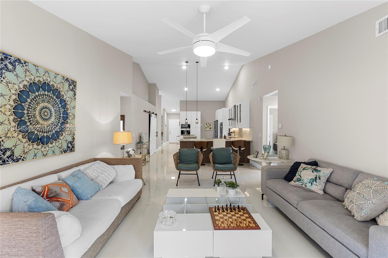 19648 Back 9 Drive Boca Raton, FL 33498 - Photo 13 of 45 a living room with furniture and a rug