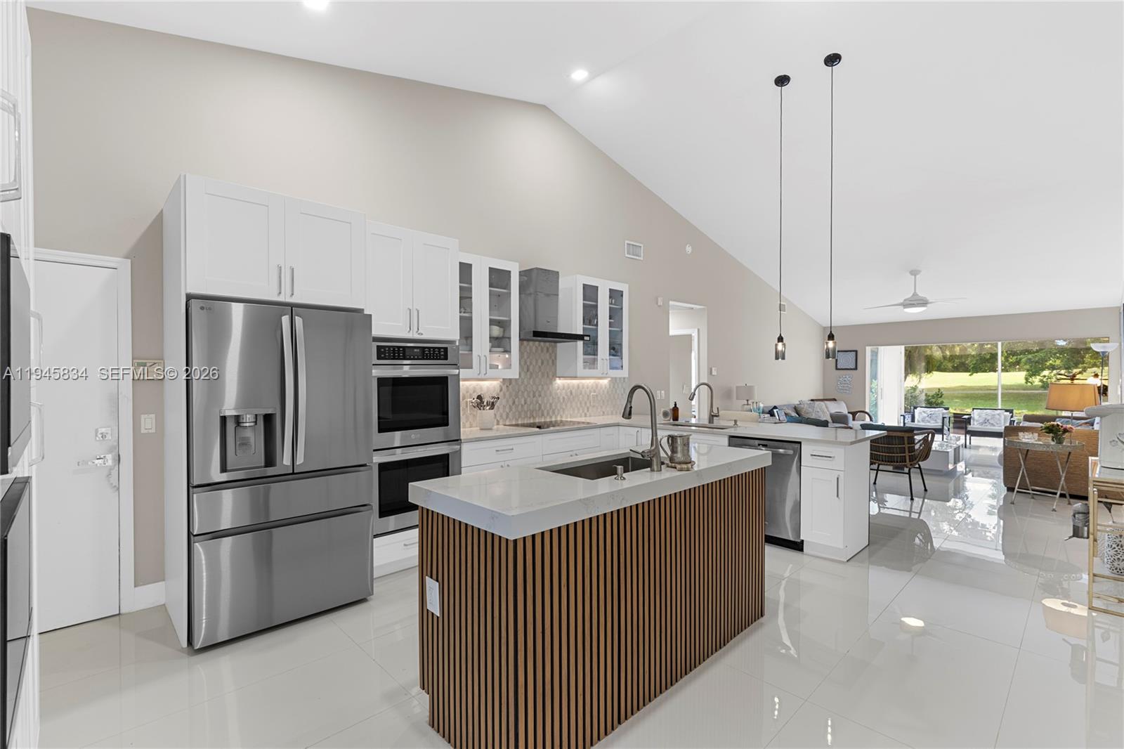 19648 Back 9 Drive Boca Raton, FL 33498 - Photo 15 of 45 a kitchen with lots of counter space and appliances