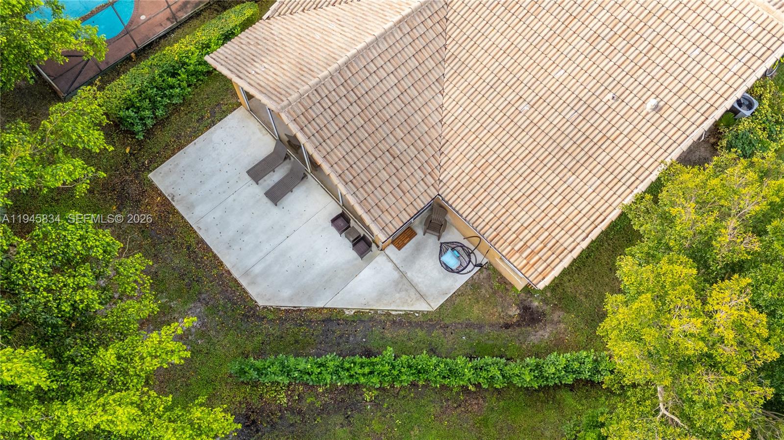 19648 Back 9 Drive Boca Raton, FL 33498 - Photo 37 of 45 an aerial view of a house with a yard and lake view
