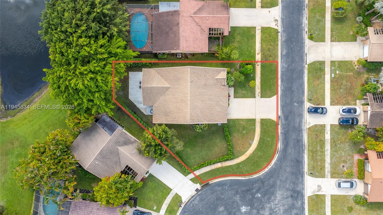 19648 Back 9 Drive Boca Raton, FL 33498 - Photo 40 of 45 an aerial view of a swimming pool with outdoor seating and yard