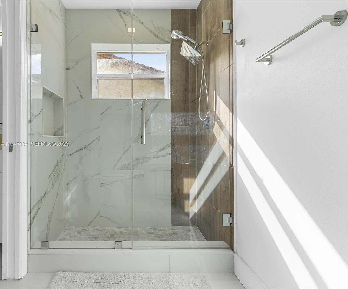 19648 Back 9 Drive Boca Raton, FL 33498 - Photo 9 of 45 a bathroom with a shower