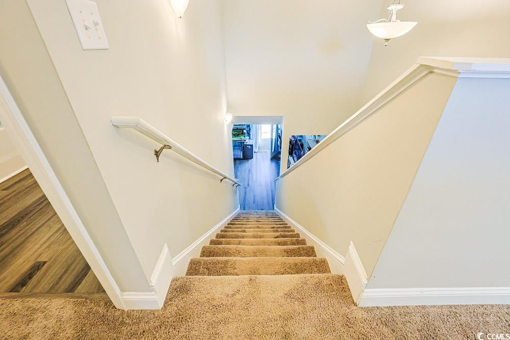 724 Hobonny Loop Longs, SC 29568 - Photo 30 of 40 Stairs with baseboards
