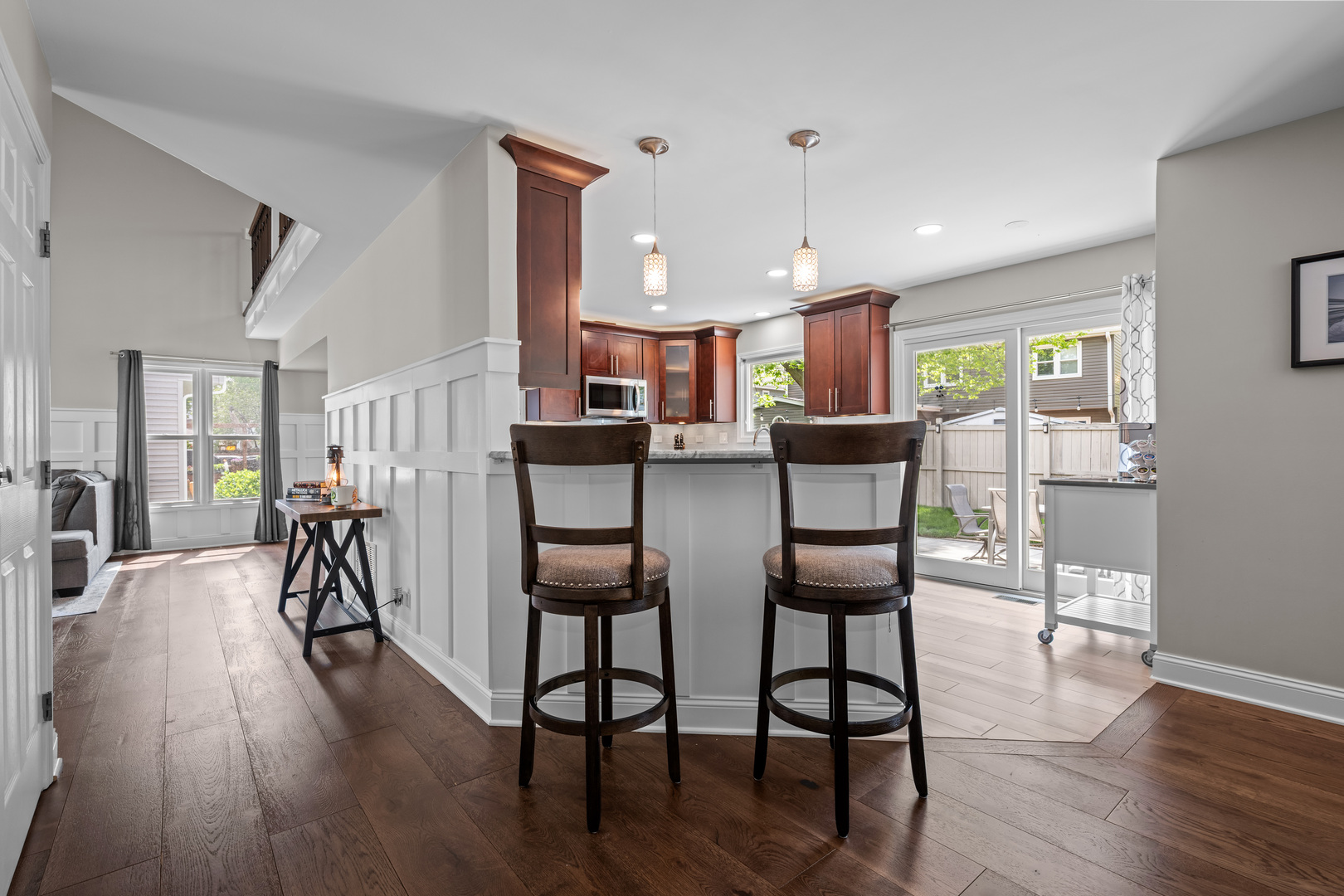 1631 Terri Circle Naperville, IL 60563 - Photo 16 of 39 a view of a dining room with furniture and wooden floor