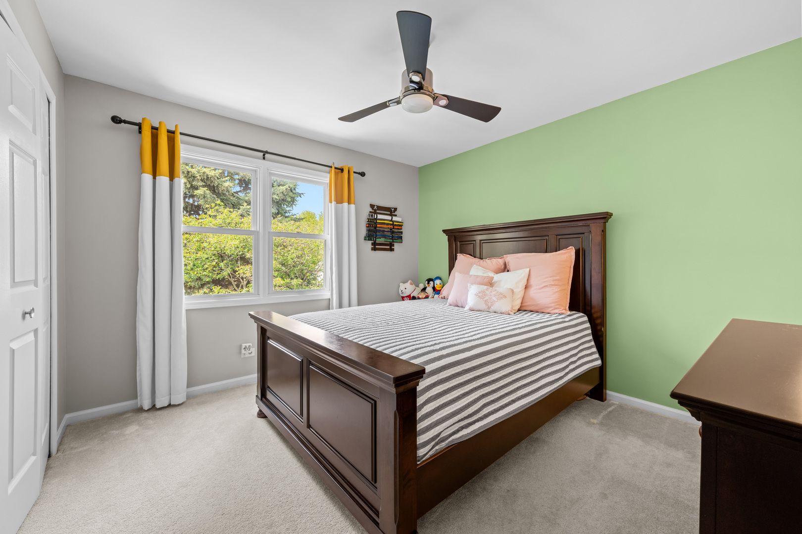 1631 Terri Circle Naperville, IL 60563 - Photo 21 of 39 a bed sitting in a room next to a window