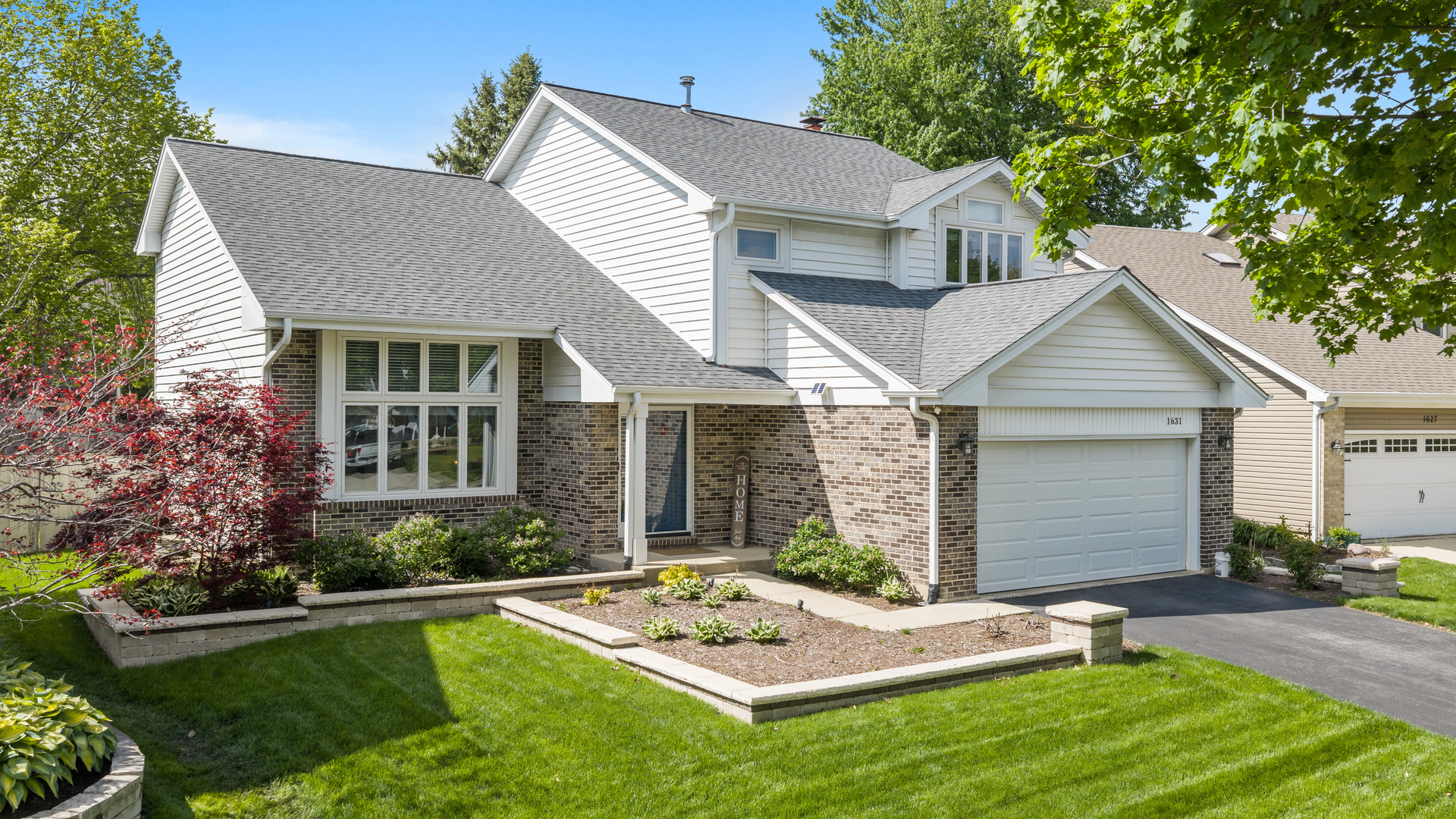 1631 Terri Circle Naperville, IL 60563 - Photo 3 of 39 a view of a house with backyard and sitting area