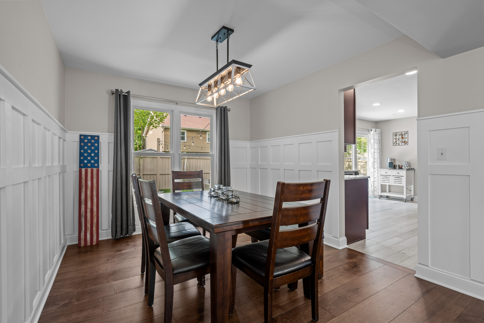1631 Terri Circle Naperville, IL 60563 - Photo 7 of 39 a view of a dining room with furniture a chandelier and wooden floor
