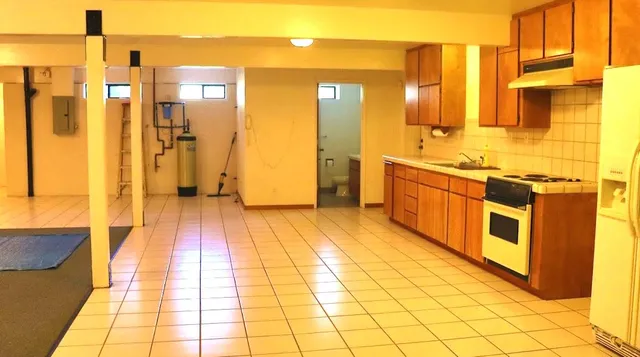 a large bathroom with a tub and shower
