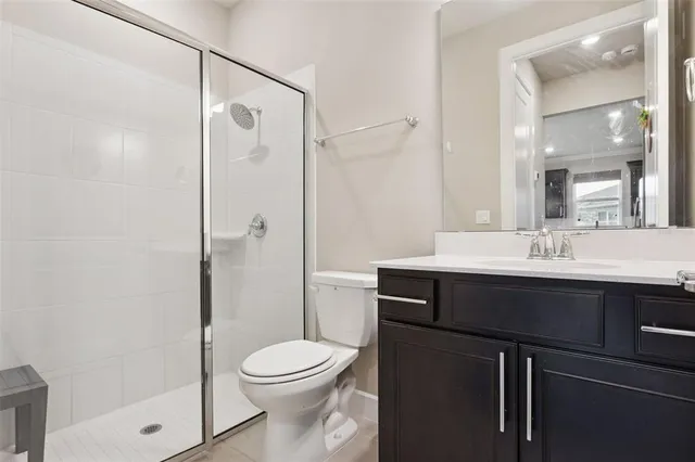 an outdoor space with patio furniture and potted plants