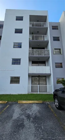 a view of a house with a street