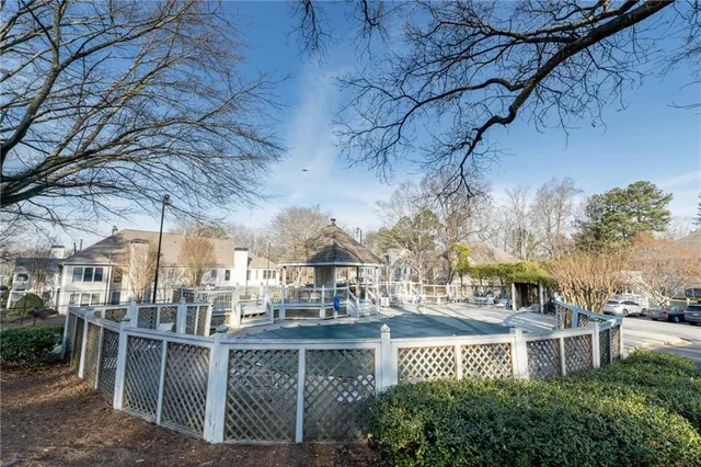 a view of a building with a yard