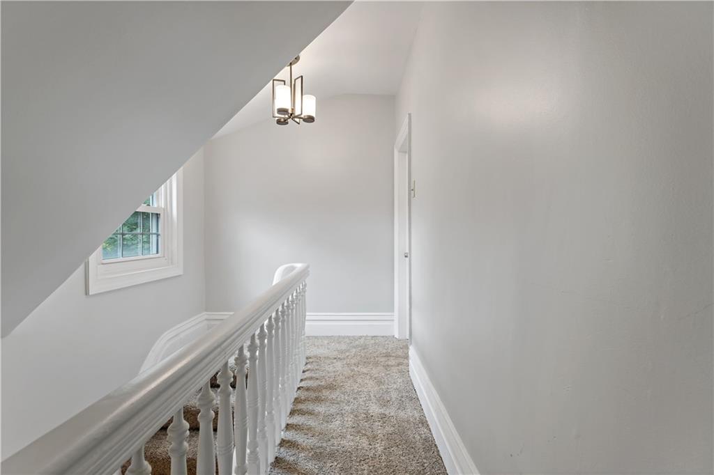 5447 Potter Street Pittsburgh, PA 15232 - Photo 20 of 36 a view of a hallway with windows