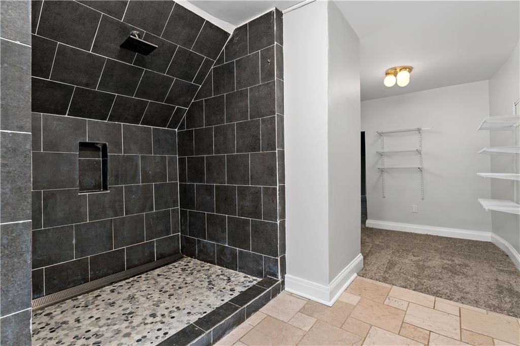 5447 Potter Street Pittsburgh, PA 15232 - Photo 24 of 36 a bathroom with a glass shower