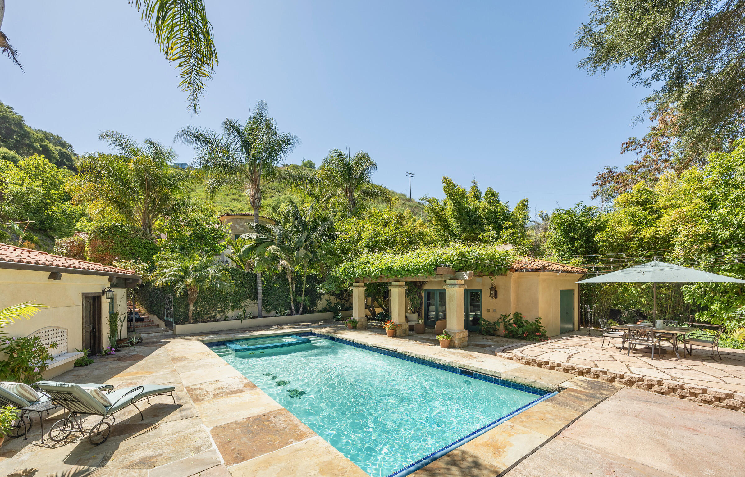 1493 Sycamore Canyon Road Montecito, CA 93108 - Photo 2 of 47 a view of a house with backyard and sitting area