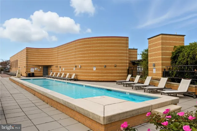 a outdoor space with lots of white furniture