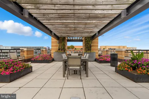 a view of a terrace with sitting area