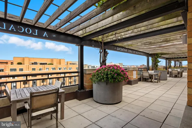 a outdoor dining space with furniture