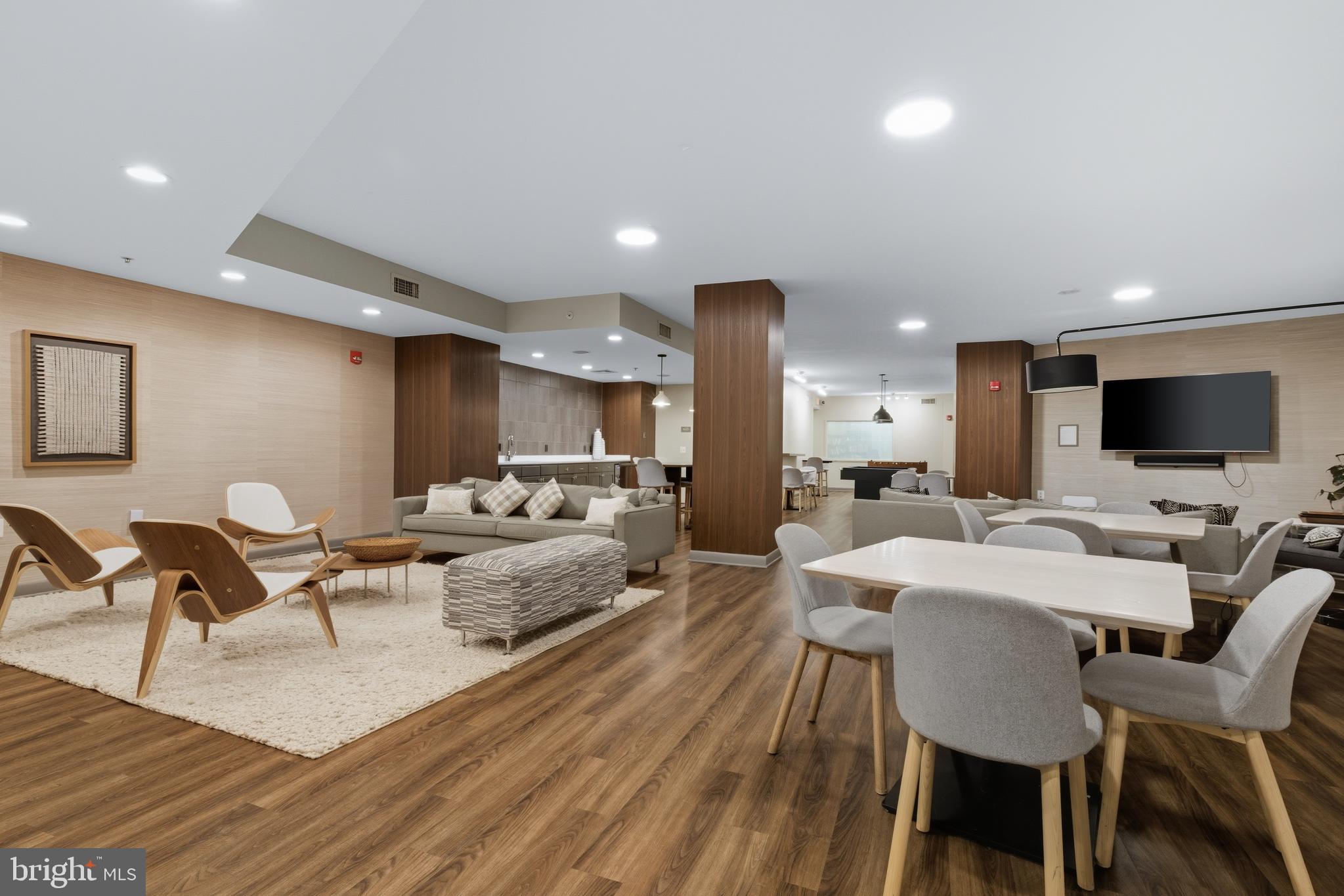 400 Massachusetts Avenue Northwest, Unit 719 Washington, DC 20001 - Photo 36 of 38 a view of a dining room with furniture